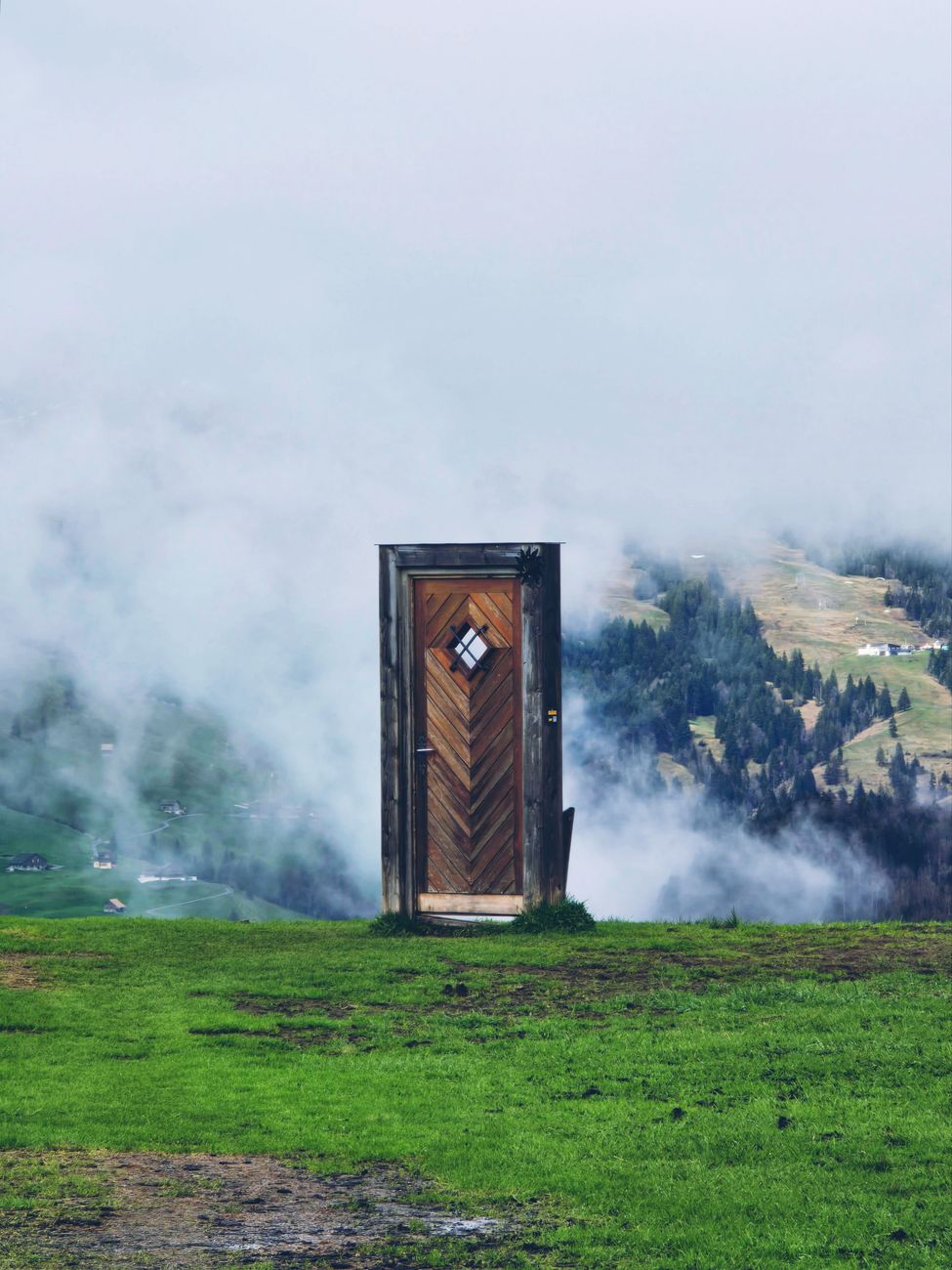 doorway to misty scenic landscape