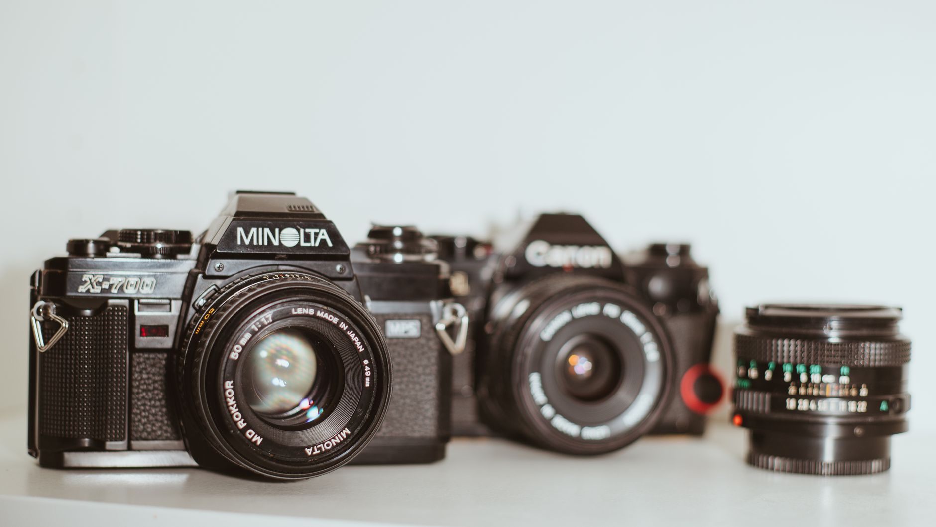 vintage analog cameras and lens on display